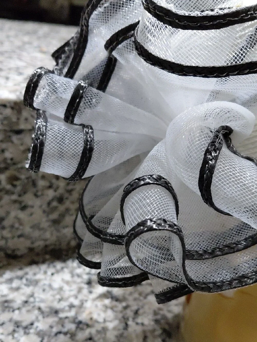 Elegant White Women's Fascinator Hat with Black Trim FAMOUS BRAND